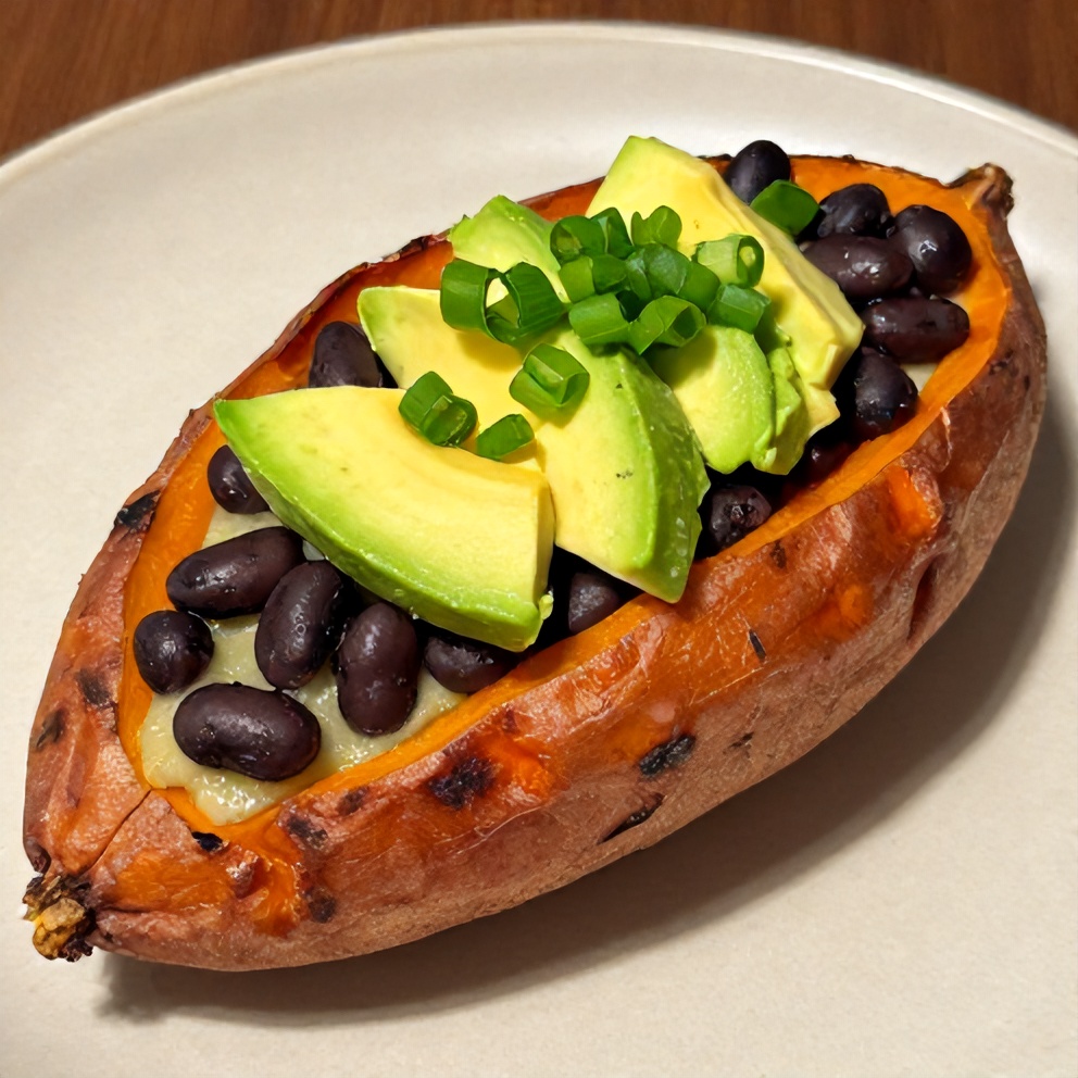 Plated black bean stuffed sweet potatoes