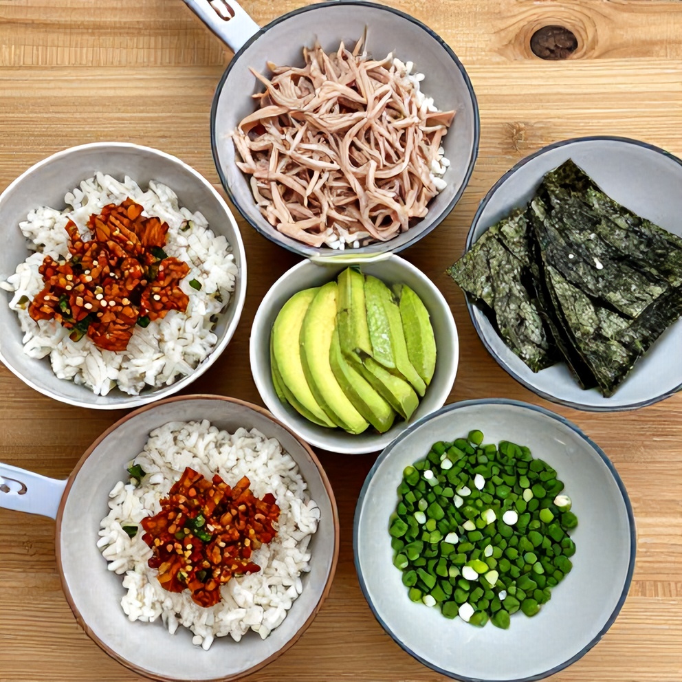 Raw ingredients for Spicy Tuna Rice Bowl on wooden surface